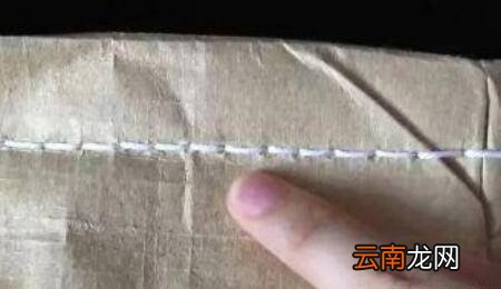 拆米袋子上的包装线绳的口诀