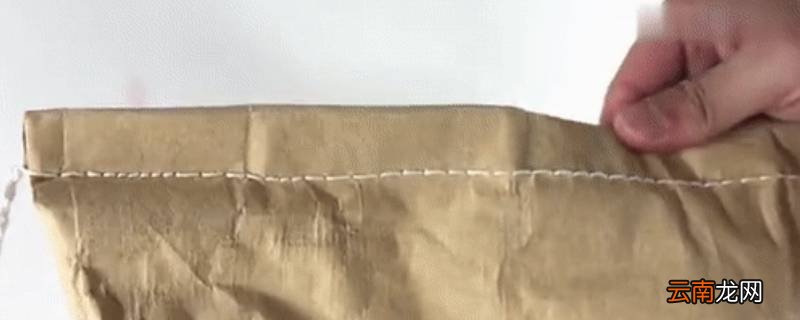 拆米袋子上的包装线绳的口诀